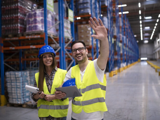 Warehouse workers organizing distribution of products to the market.